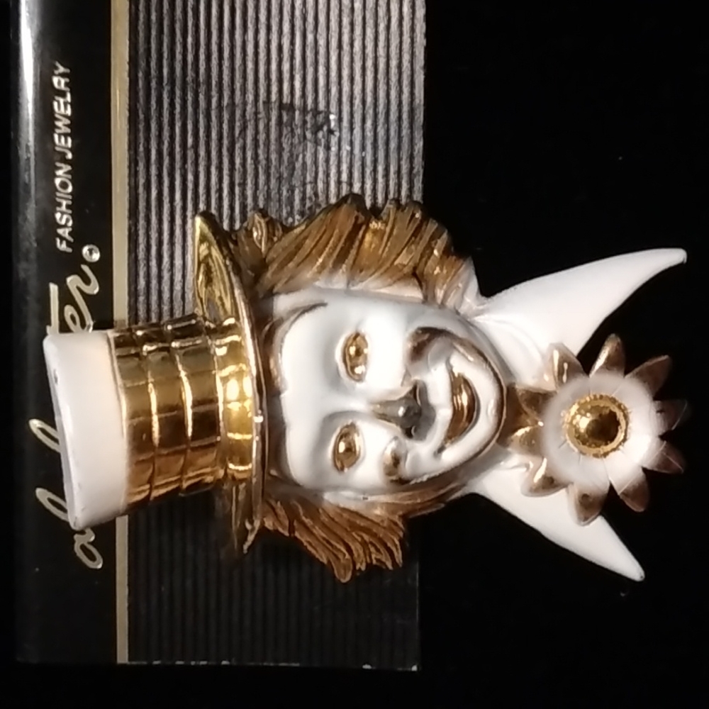 Clown brooch white enamel on golden medal